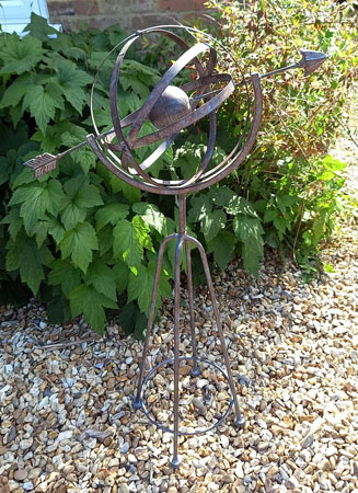 Image of Decorative Metal Armillary Sphere Globe Garden Sculpture in a Rustic Bronze Finish