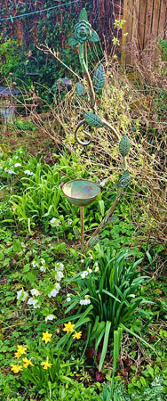 Image of Bird Bath on Stake with Decorative Leaves